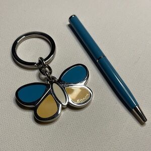 Coach Blue and Cream Butterfly Keychain with a Blue Coach Pen